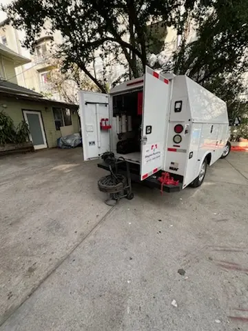 Magnet Plumbing service vehicle on-site for Grease Trap Cleaning in Hamptons at Boca Raton